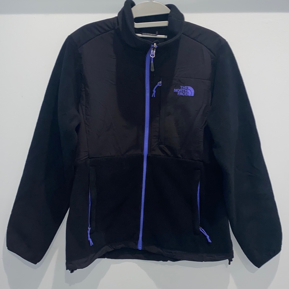 The north face women’s with purple logo and zipper